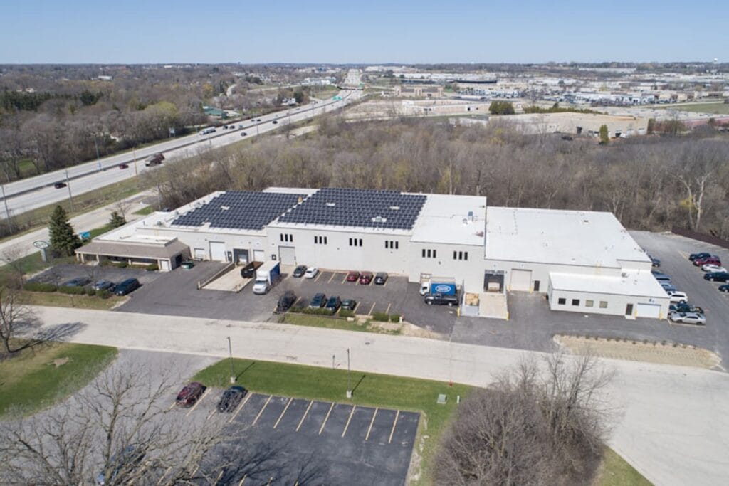 Commercial facility with rooftop solar panels.